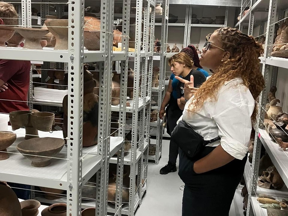 Students examining artifacts.